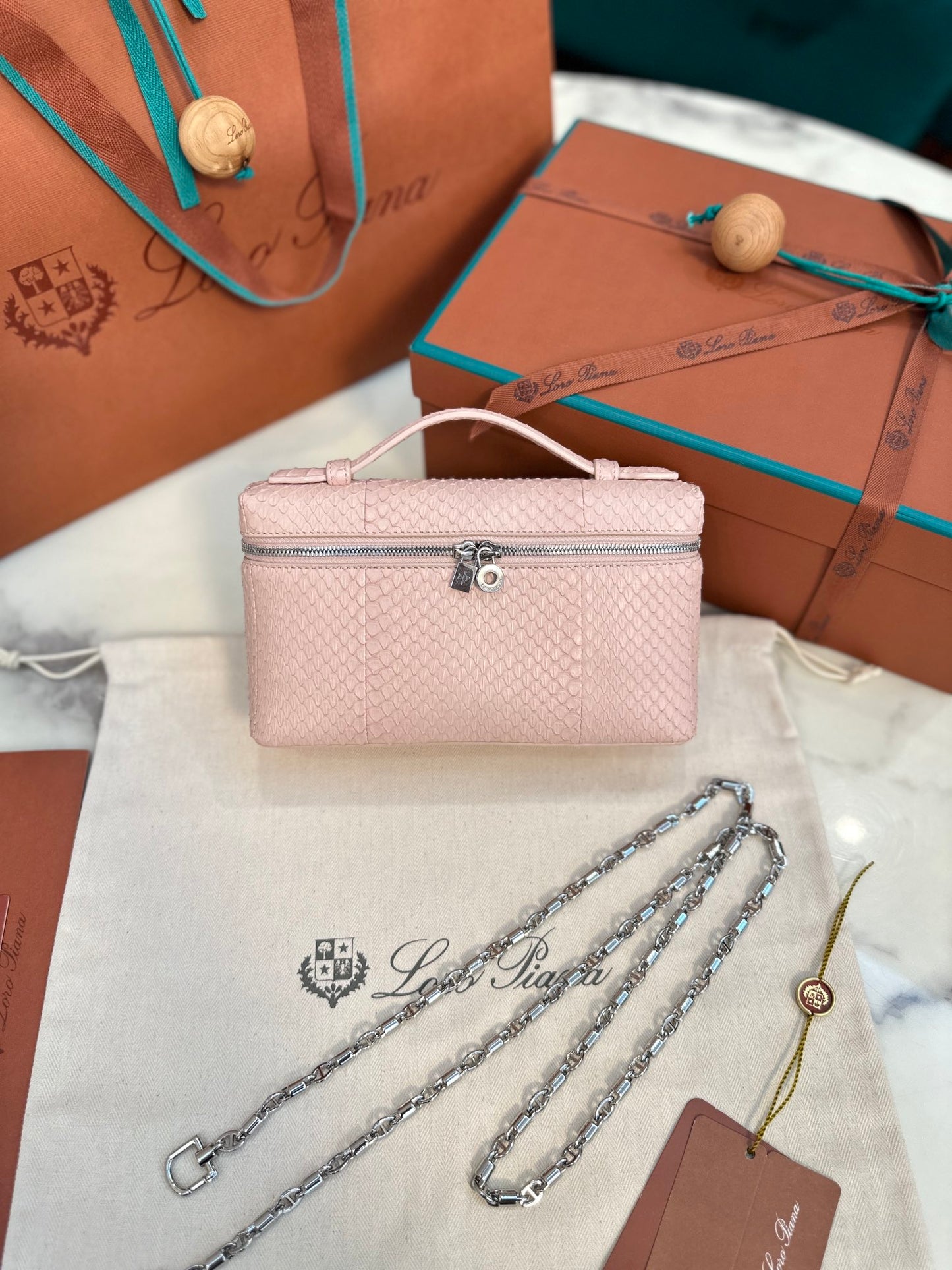 Textured Leather Clutch with Chain Strap