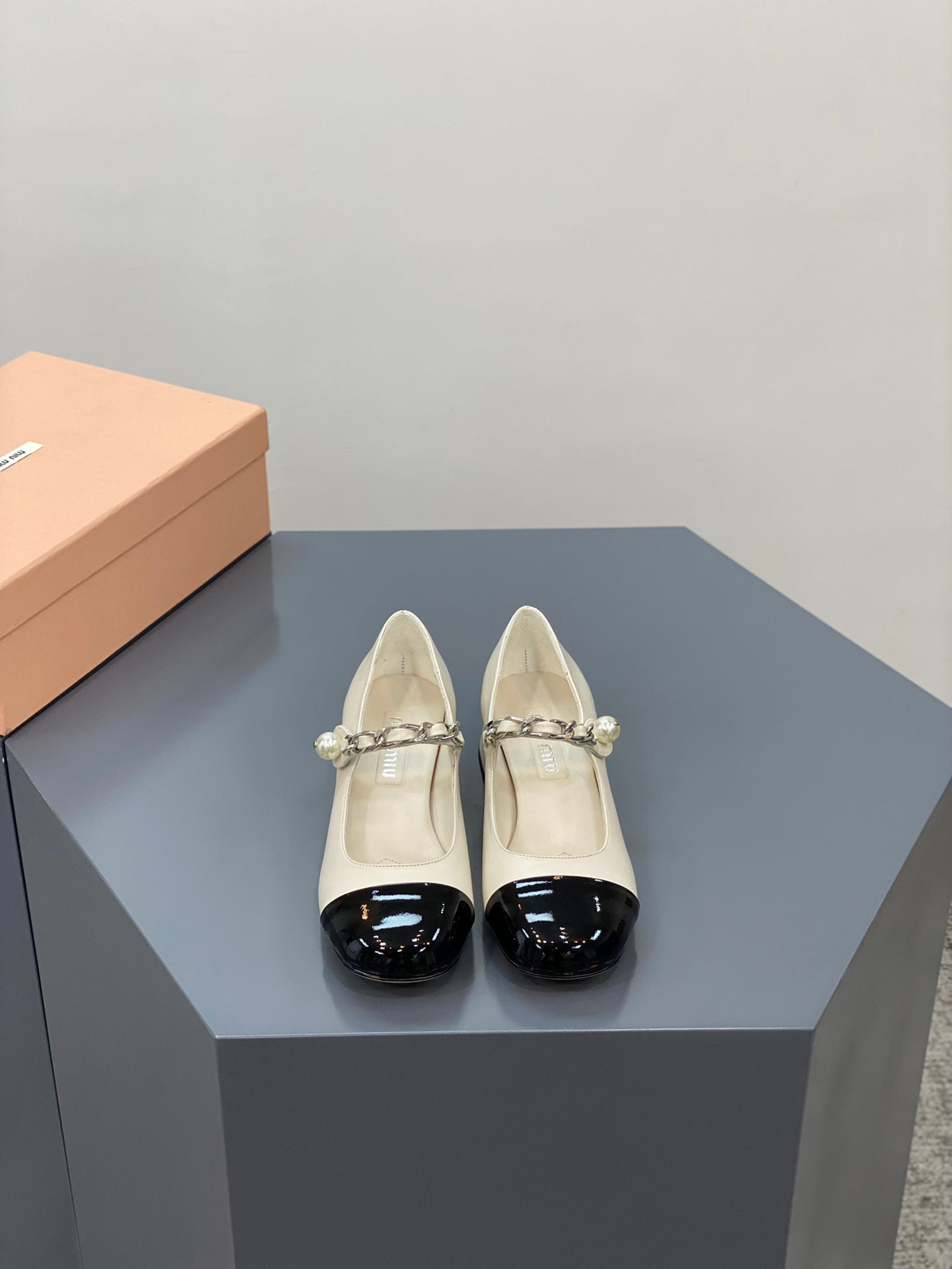 Beige and black heels