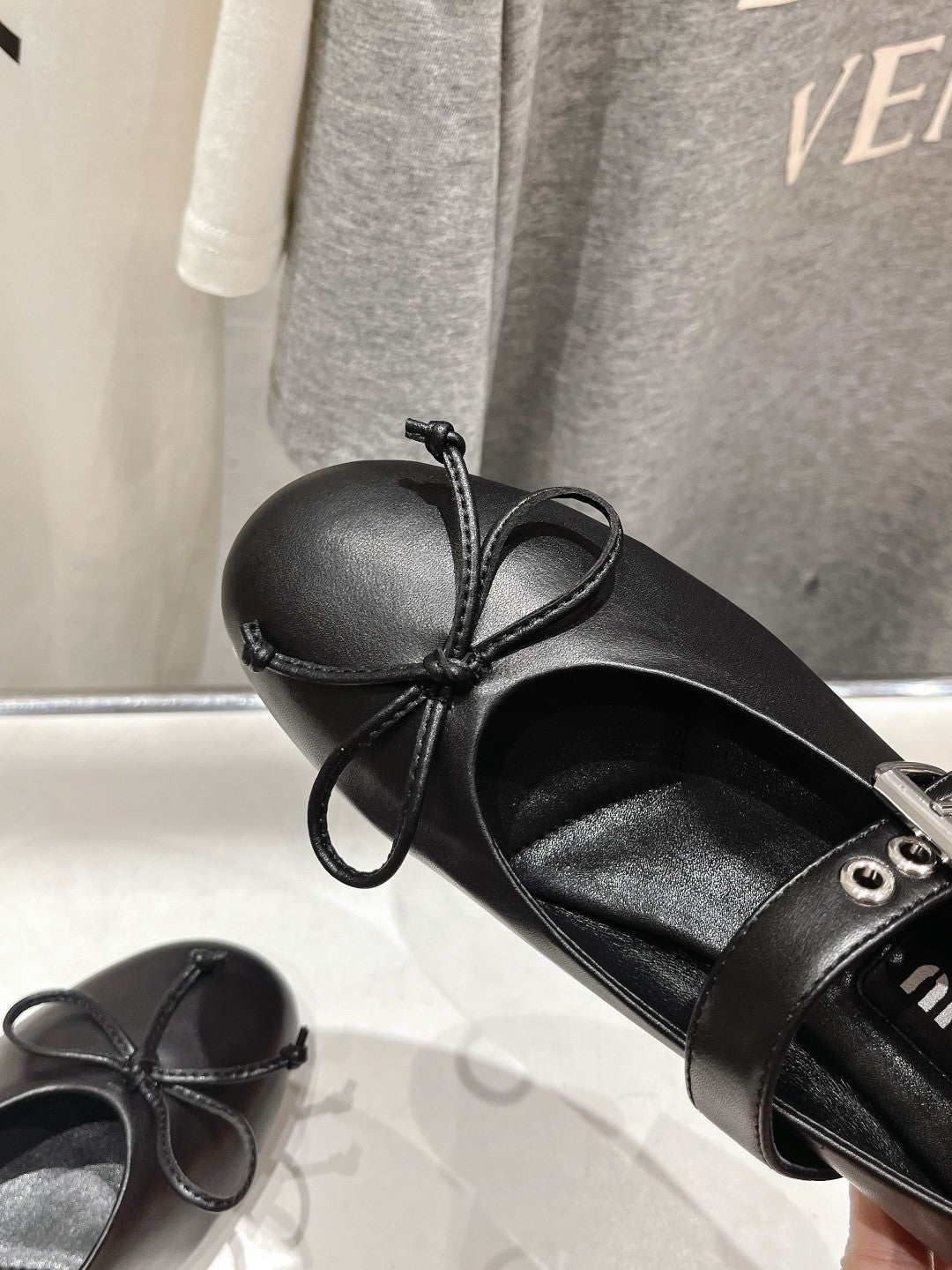 Beige and black heels