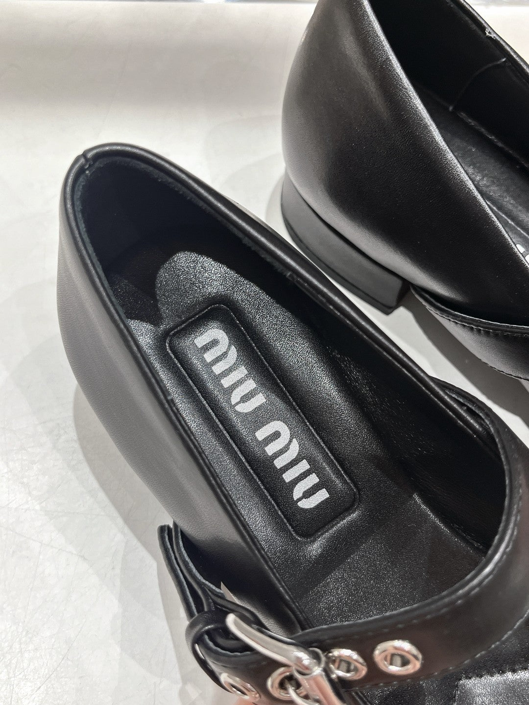 Beige and black heels