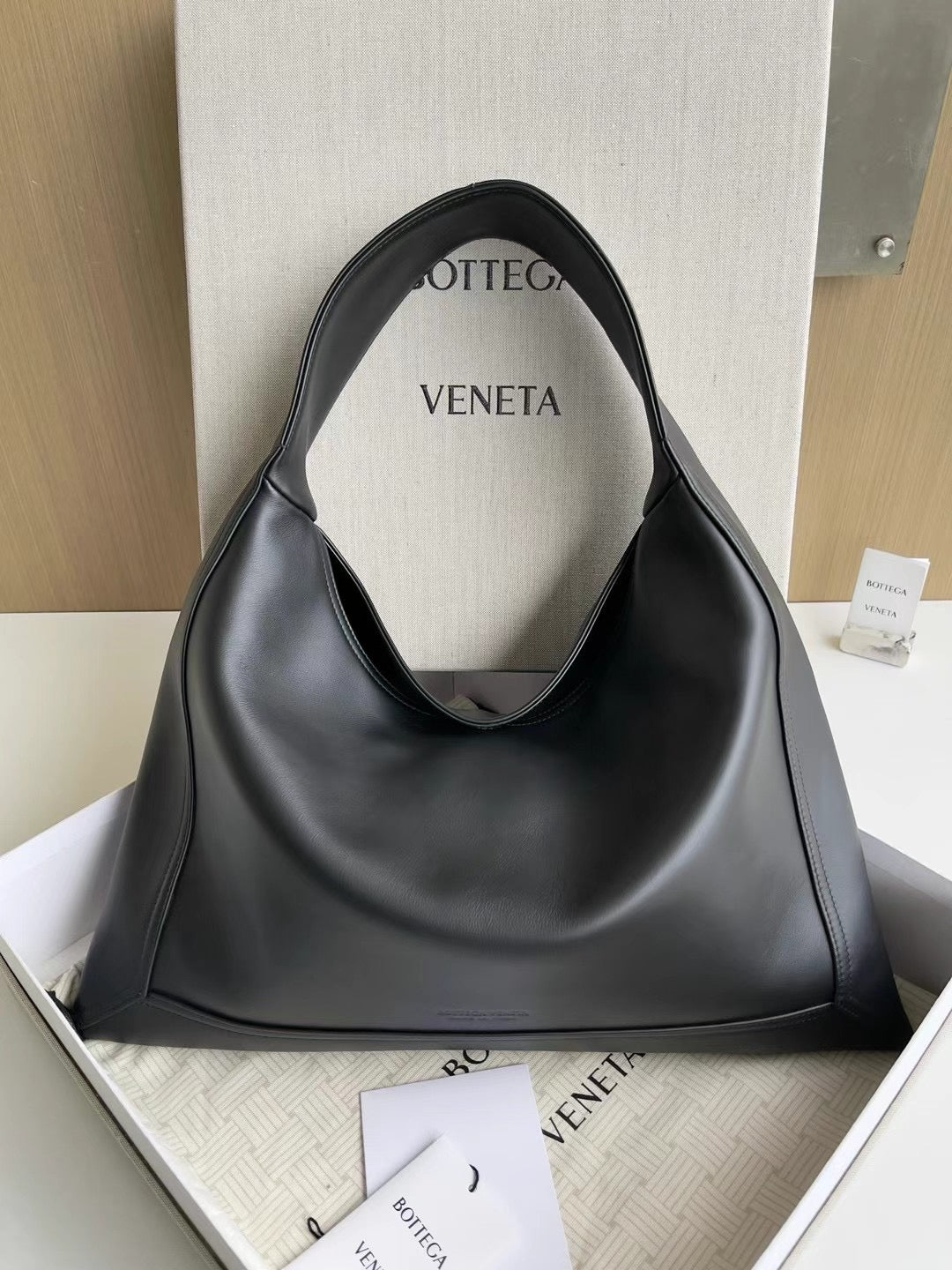 Smooth Leather Triangle Hobo Bag
