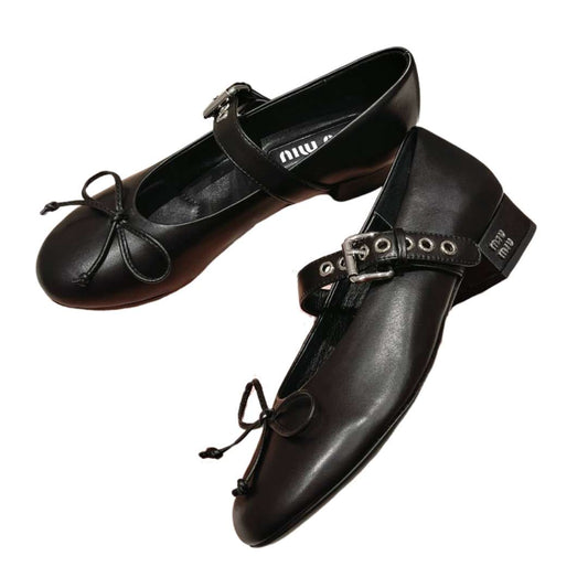 Beige and black heels