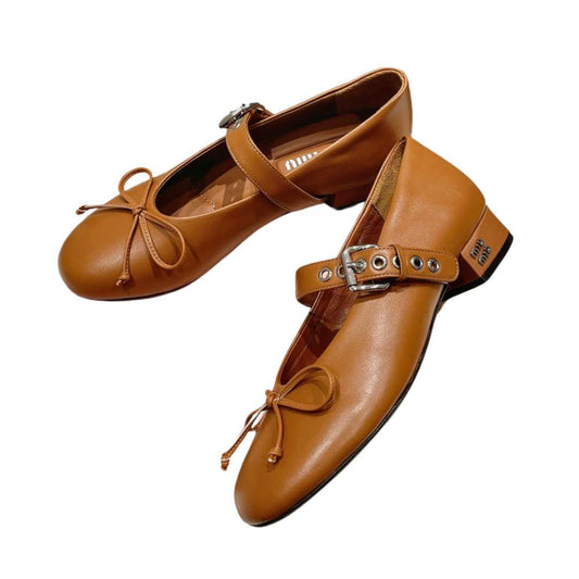 Beige and black heels