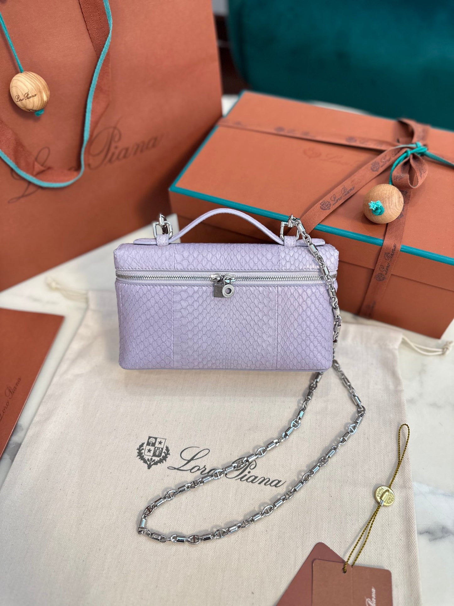 Textured Leather Clutch with Chain Strap