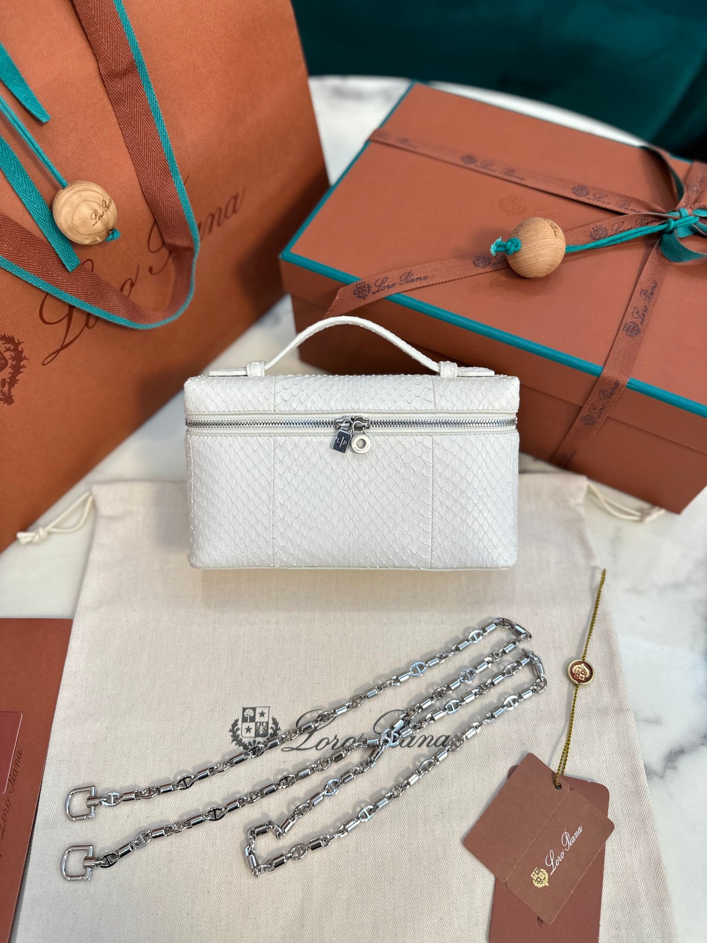 Textured Leather Clutch with Chain Strap
