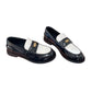 Black and white loafers