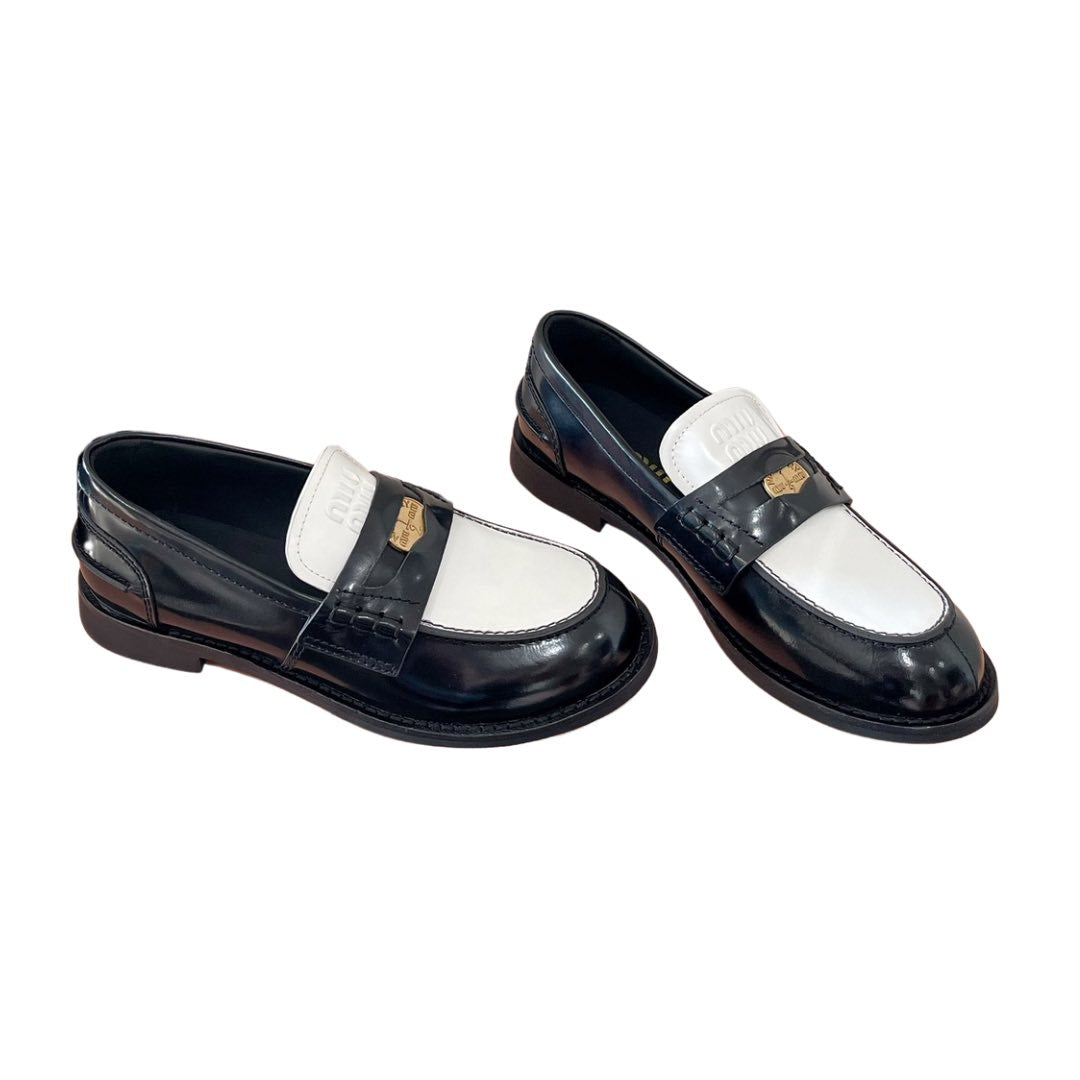 Black and white loafers
