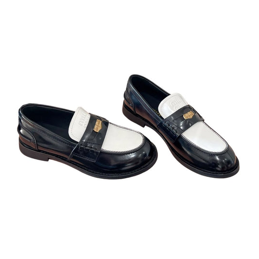 Black and white loafers
