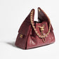 25 Grained Calfskin & Gold-Tone Metal Handbag