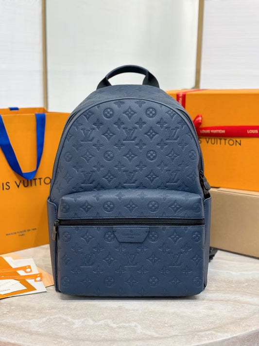 Monogram Embossed Backpack with Front Zip Pocket