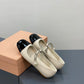 Beige and Black Ballerina