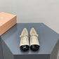 Beige and black heels